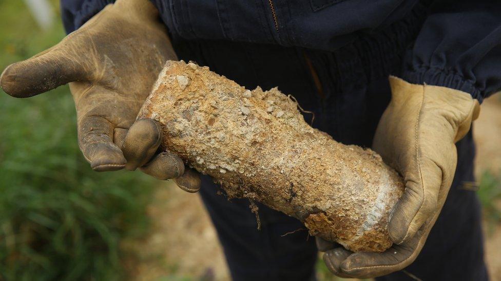 An unexploded artillery shell