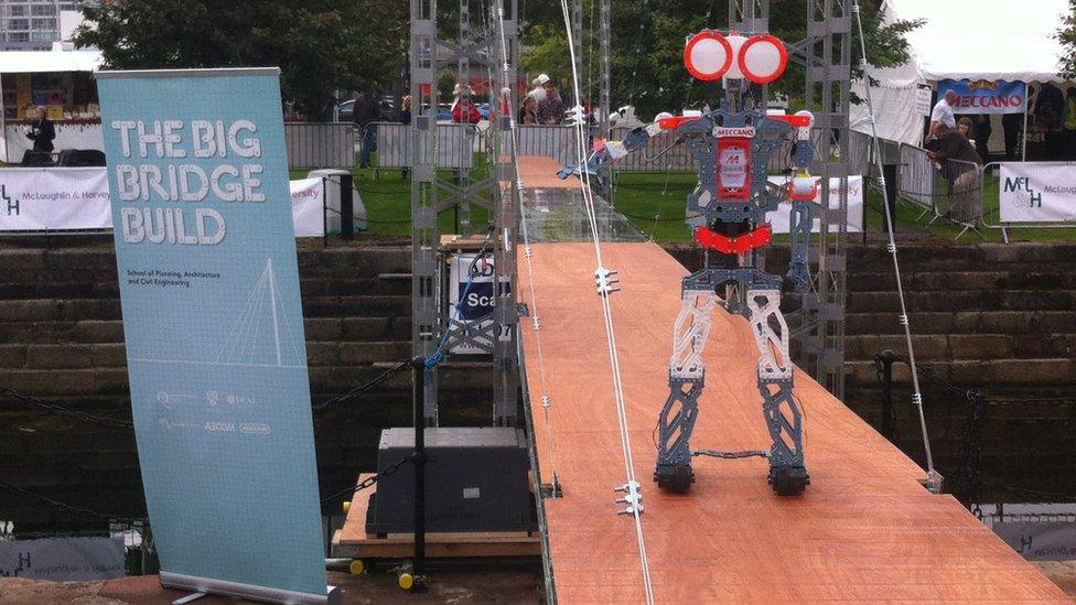 Robot crossing bridge