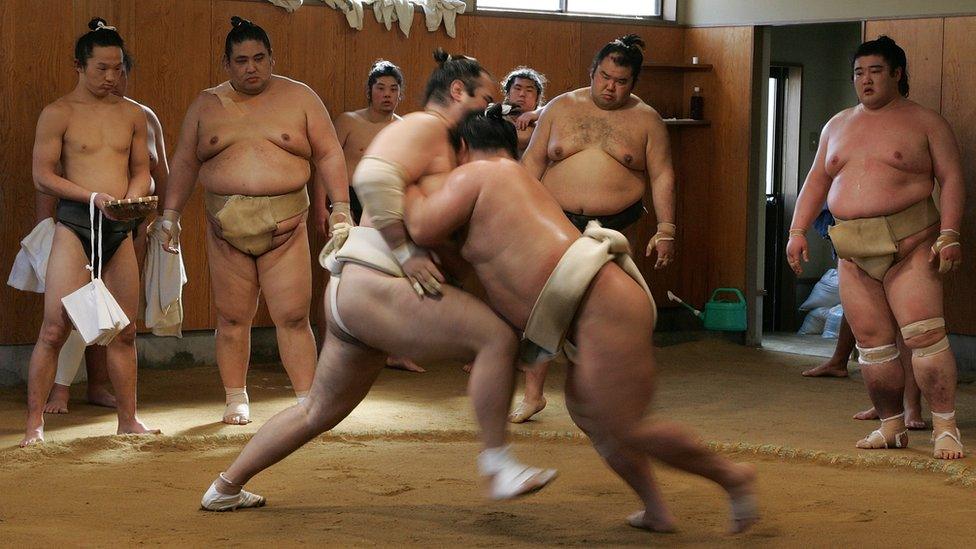 Sumo wrestlers take part in a training session at Musashigawa Sumo Stable on March 1, 2007 in Osaka, Japan