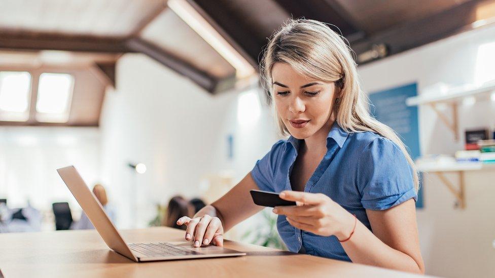 Woman using card online