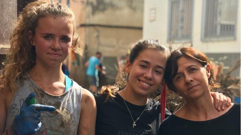 Aine (L) with family in Sant Llorenç