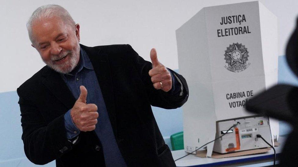 Brazil's former President Luiz Inácio Lula da Silva votes in the country's election on Sunday