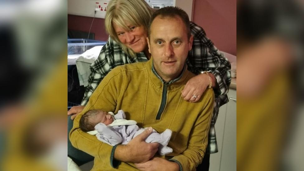 Andy Maxfield with his wife and baby Georgia