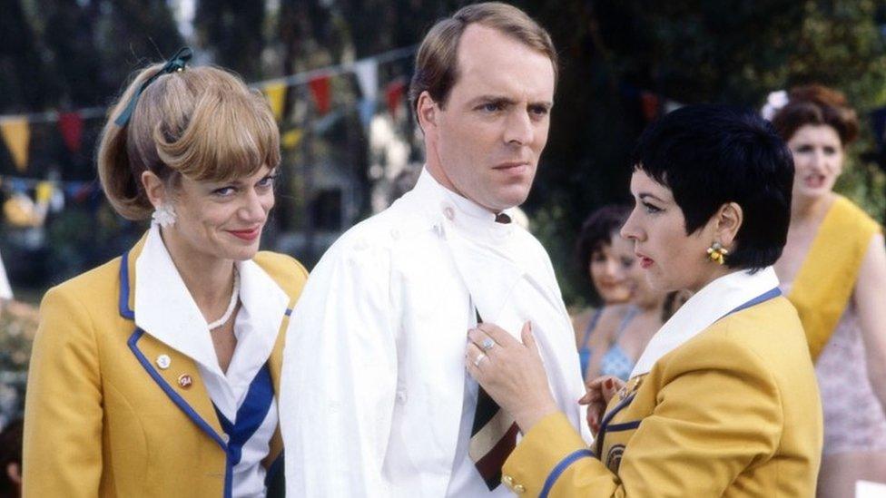 Nikki Kelly as Sylvia Garnsey, Simon Cadell as Jeffrey Fairbrother and Ruth Madoc as Gladys Pugh in the pilot episode of "Hi-De-Hi".