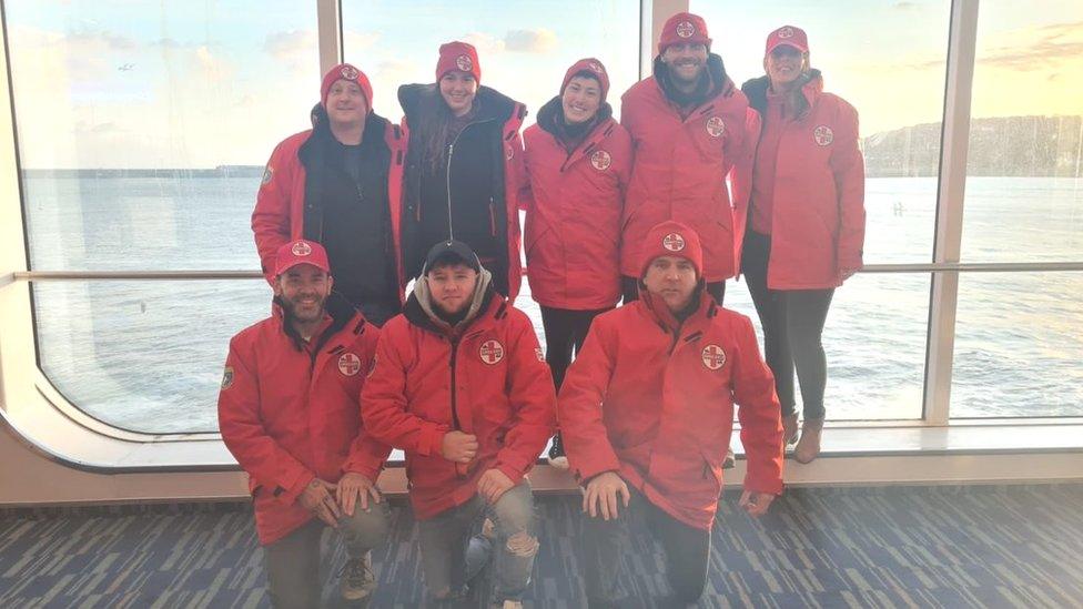 Volunteers photographed on a cross-Channel ferry