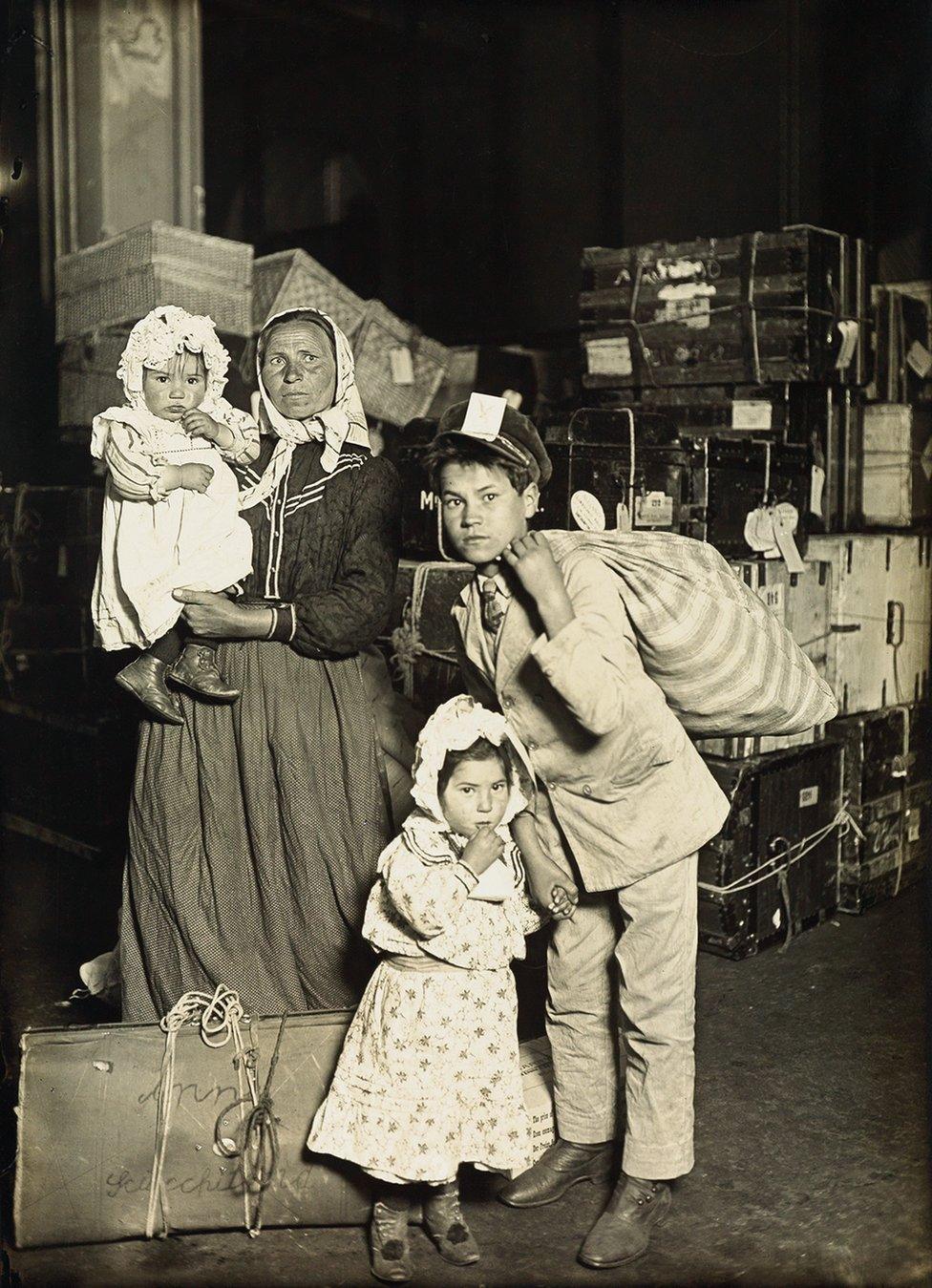 A family together with their bags.