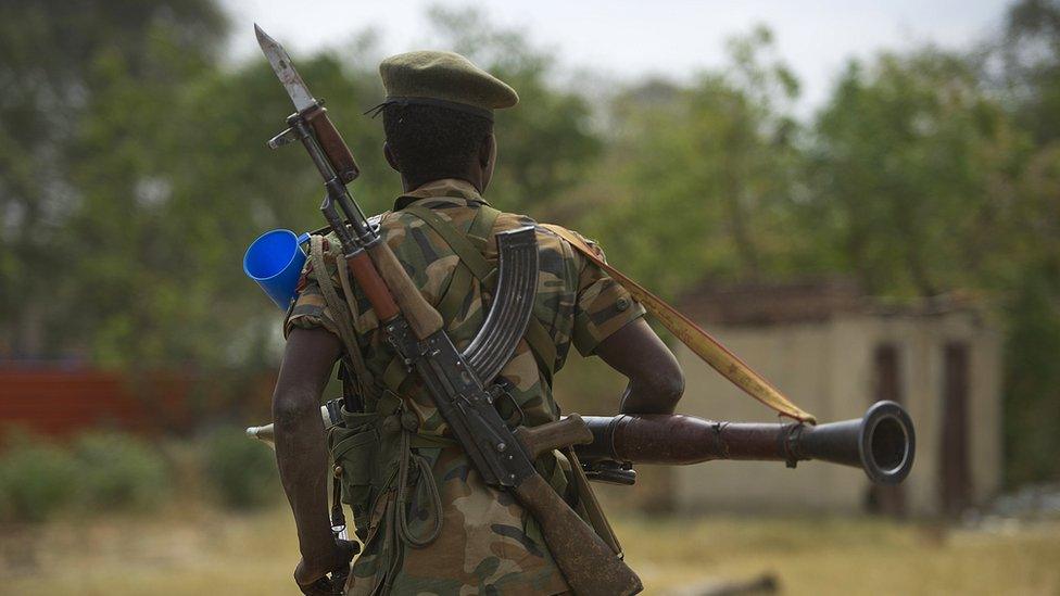 South Sudanese People Liberation Army (SPLA) soldier patrols in Malakal in January 2014