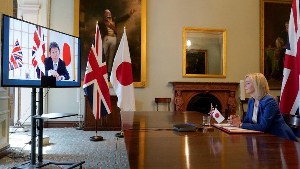 State for International Trade Liz Truss speaking to Japan"s Minister for Foreign Affairs Toshimitsu Motegi at the Department for International Trade