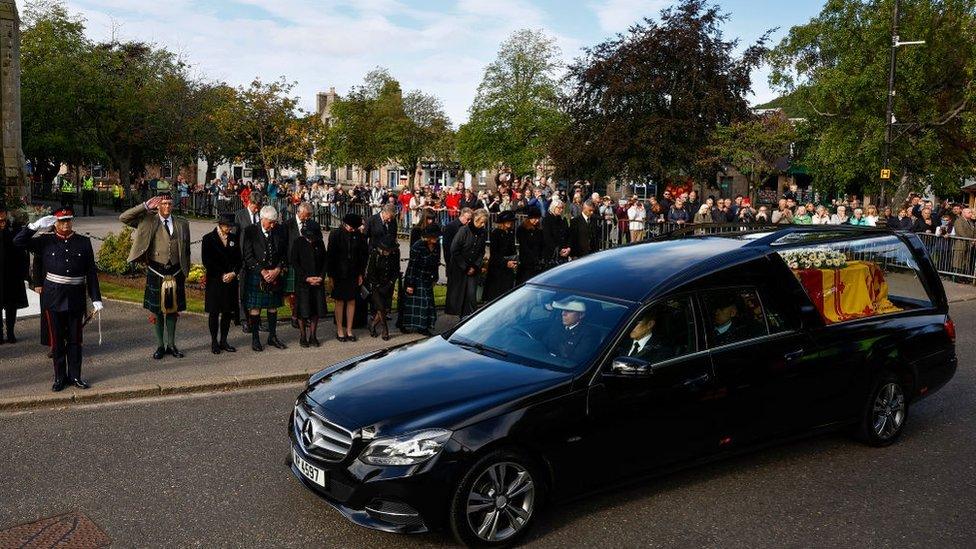 People lining the streets to pay their respects to the Queen