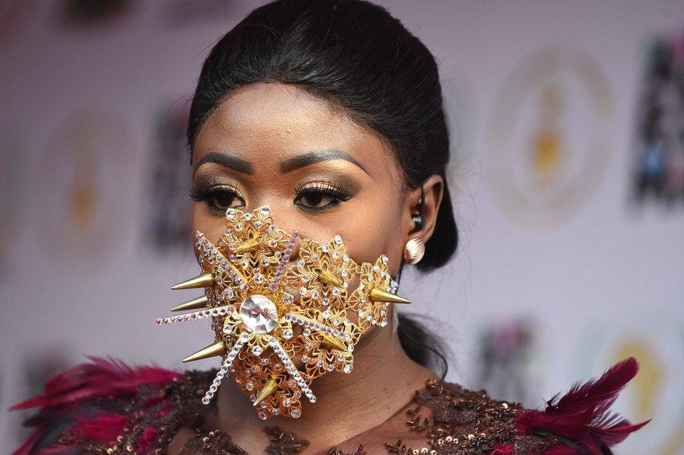 Ghanaian model Nana Akua Addo poses on the red carpet during the All Africa Music Awards in Lagos on November 12, 2017