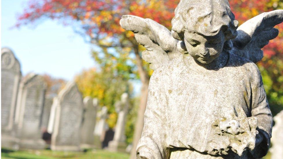 graveyard with stone angel