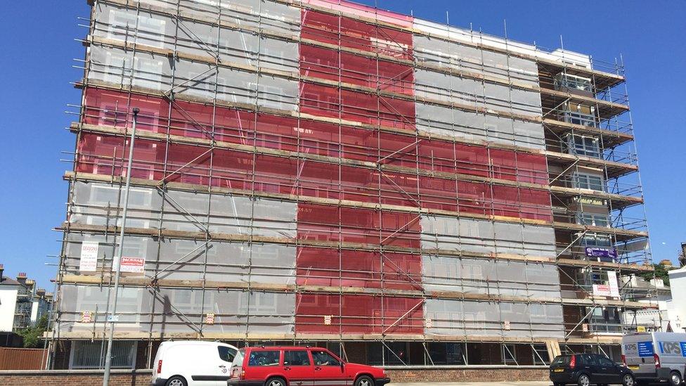 The building in Hove with the England flag erected