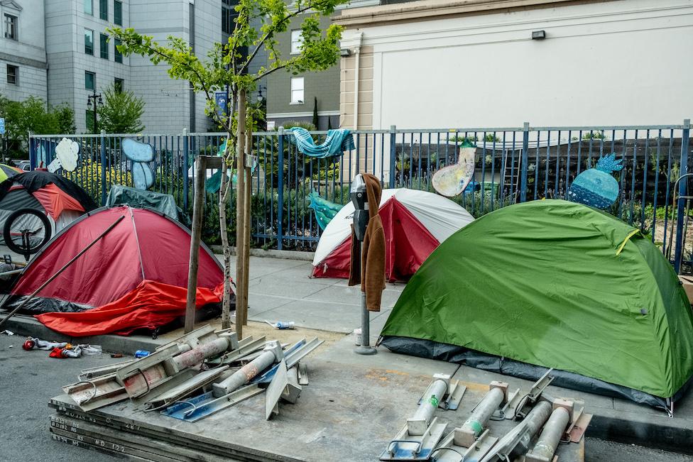 Homeless people sleep rough in San Francisco