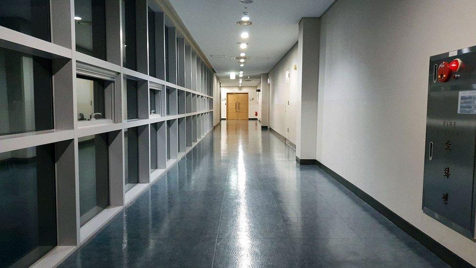 A deserted school corridor.