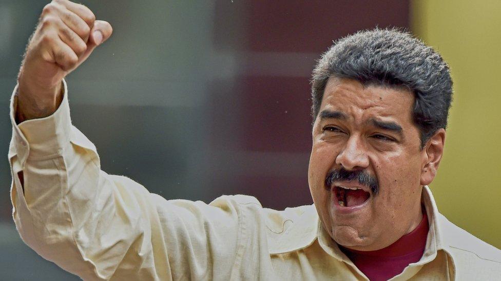 Venezuelan President Nicolas Maduro gestures during a rally in Caracas on April 19, 2016.