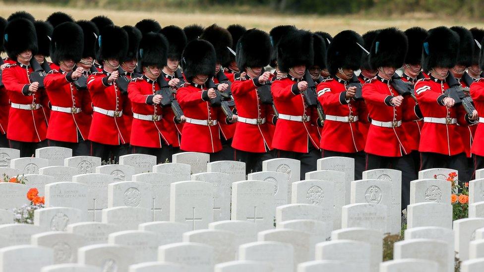 The Irish Guards arrive at the Tyne Cot Commonwealth War Graves Cemetery for the commemorations