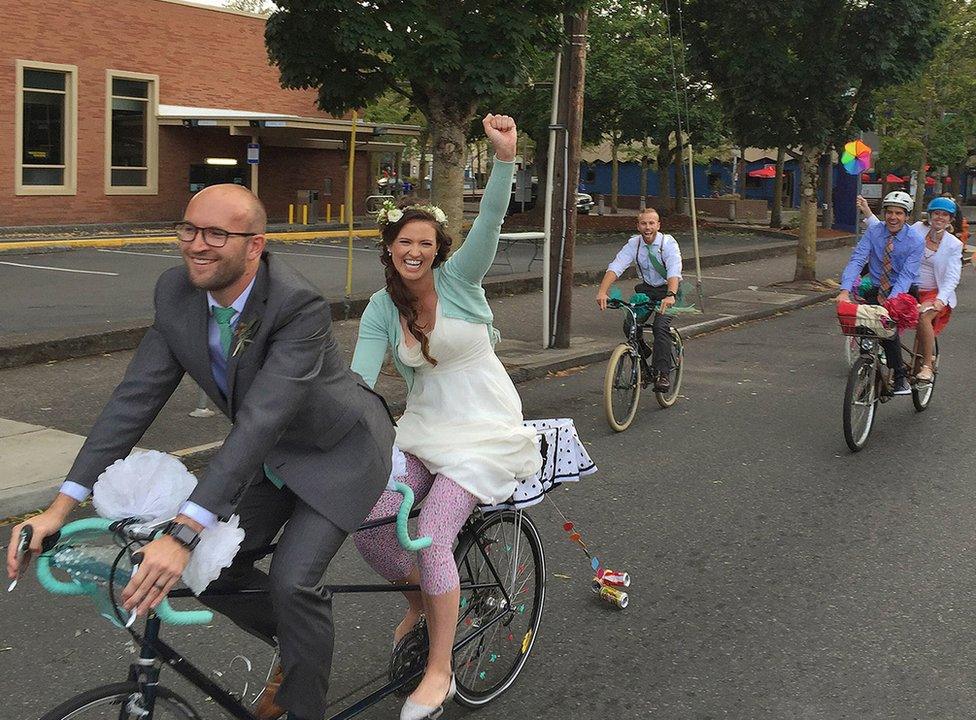 Wedding couple on bicycle