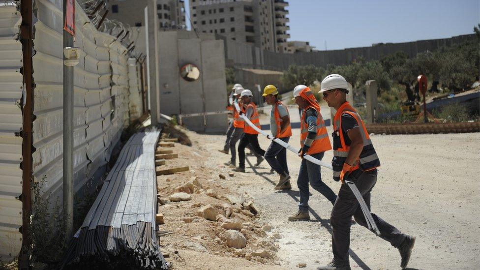 Bridge construction workers