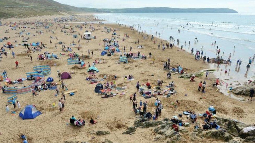 Holidaymakers at Woolacombe, Devon