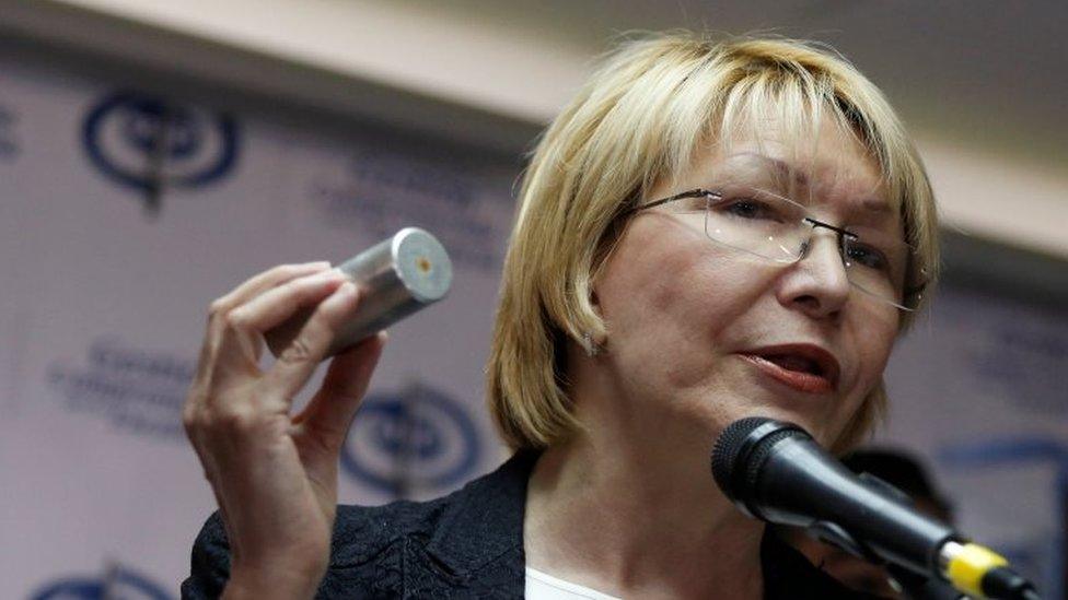 Venezuela's chief prosecutor Luisa Ortega Diaz holds a tear gas canister as she talks to the media during a news conference in Caracas, Venezuela May 24, 2017.