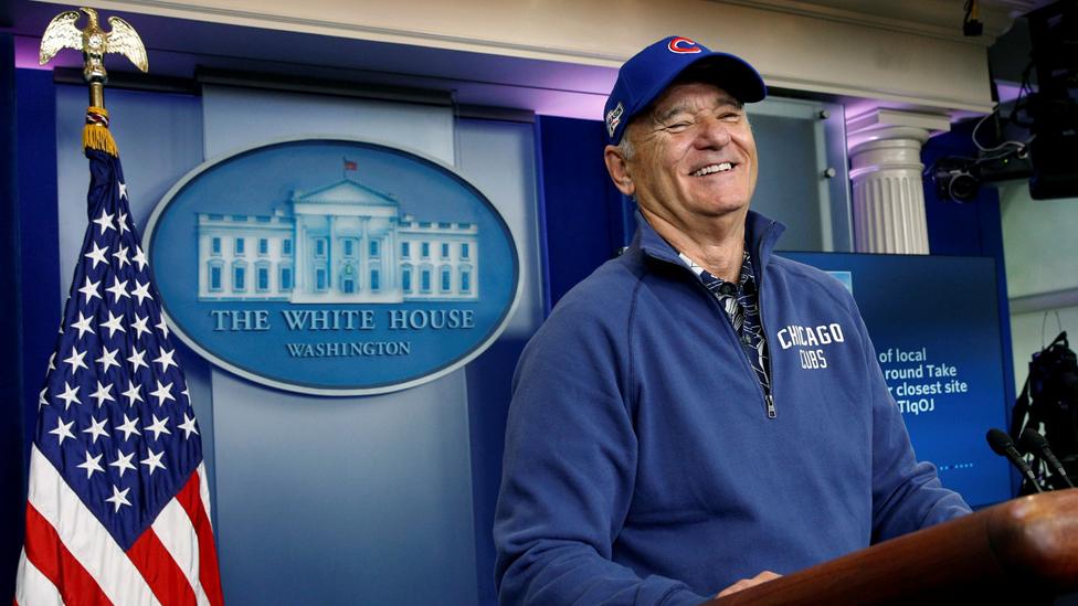 Actor Bill Murray, in Chicago Cubs attire, takes to the lectern in the briefing room during a visit to the White House - 21 October 2016