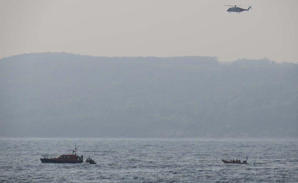 Lifeboats and SAR helicopter