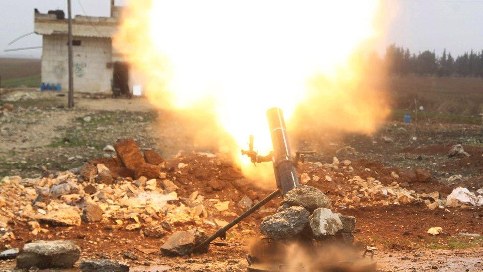 Free Syrian Army fighter fires a shell towards Islamic State fighters in the northern Aleppo countryside, Syria, January 18, 2016