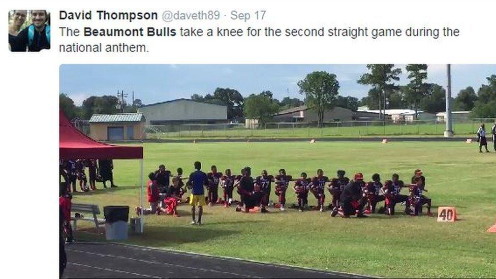 students kneeling