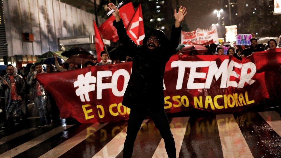 Demonstrators take part in a protest against Brazil"s President Michel Temer in Sao Paulo, Brazil on 18 May