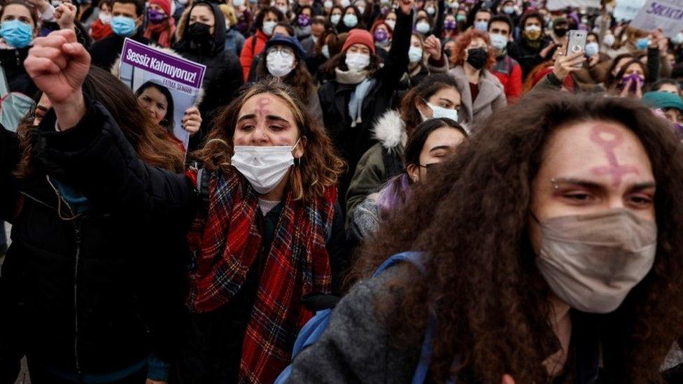 Activists participate in a protest against Turkey's withdrawal from Istanbul Convention