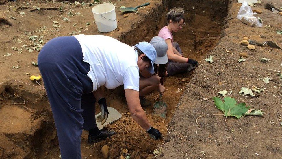 Volunteers working on a dig