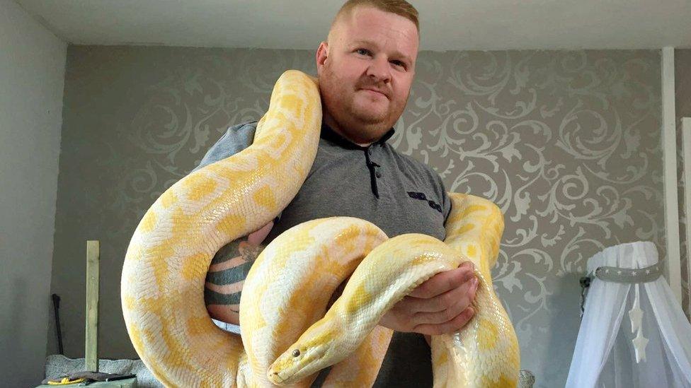 Scott holding a snake