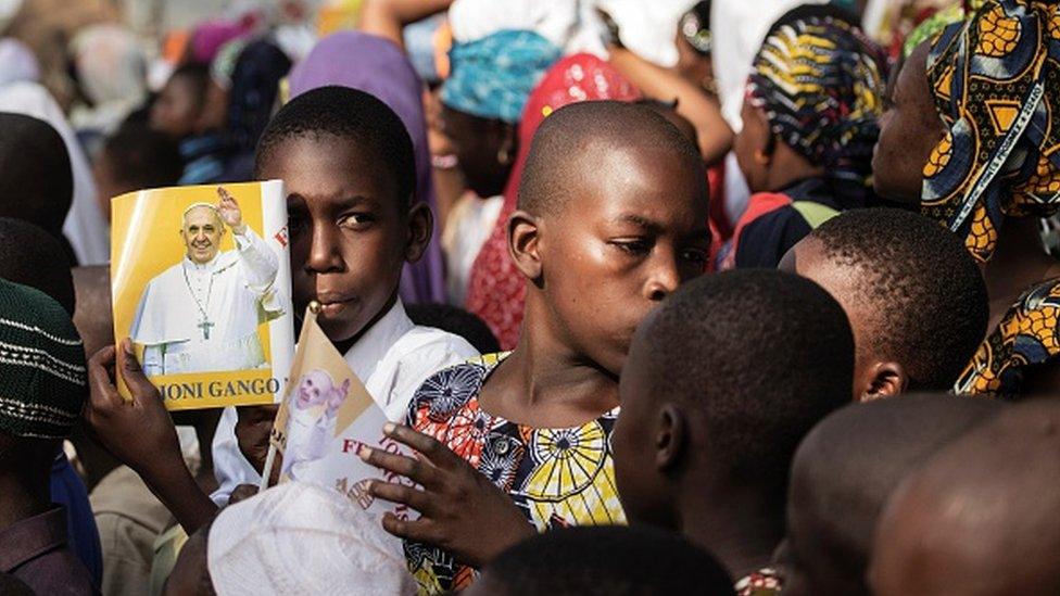 Muslim children wait for the arrival of Pope Francis to the Central Mosque in Bangui, Central African Republic