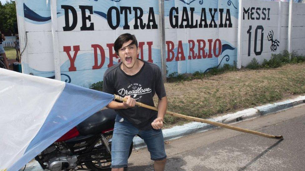 Fan celebrates after Argentina won the Qatar 2022 FIFA World Cup title, in Rosario, Argentina, 18 December 2022.