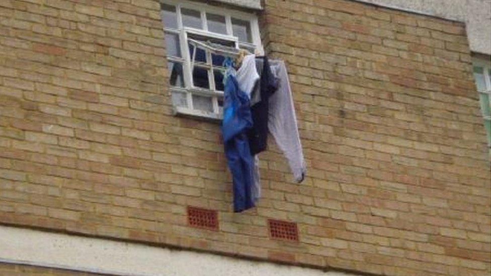 Prisoner’s clothing drying outside cell