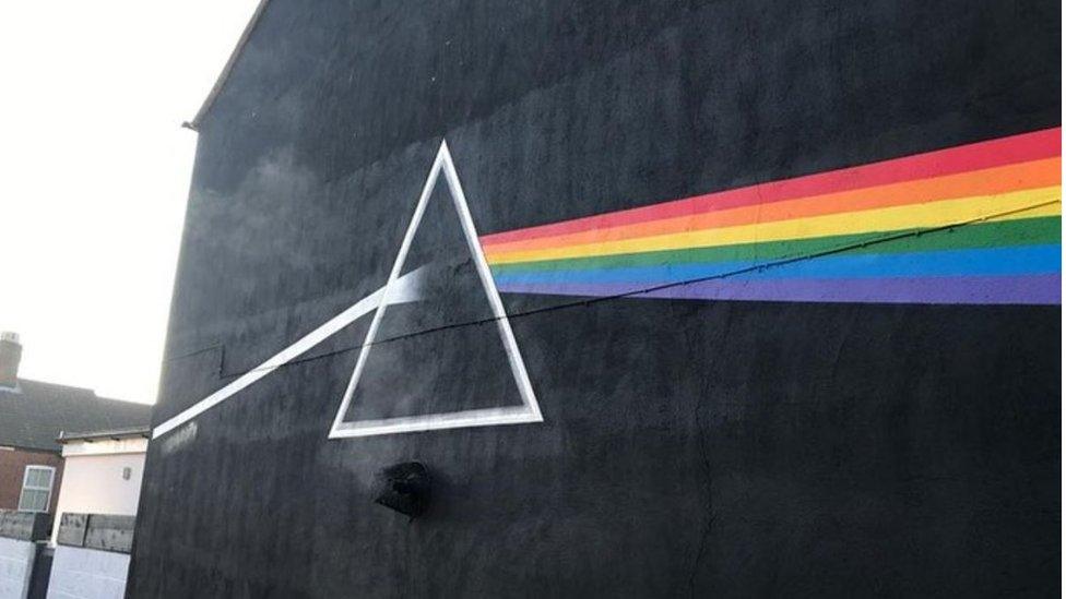 Dark Side of the Moon graffiti on a terrace house