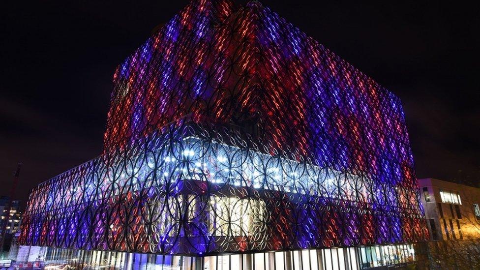 The library of Birmingham illuminated in the colours of the French flag