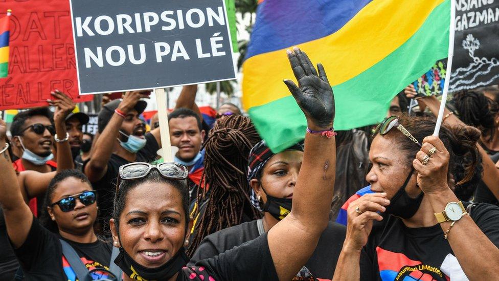 People protest against the government's response to the oil spill disaster that happened in early August, at Place d'Armes near Prime Minister's Office in Port Louis, on the island of Mauritius, on August 29, 2020.