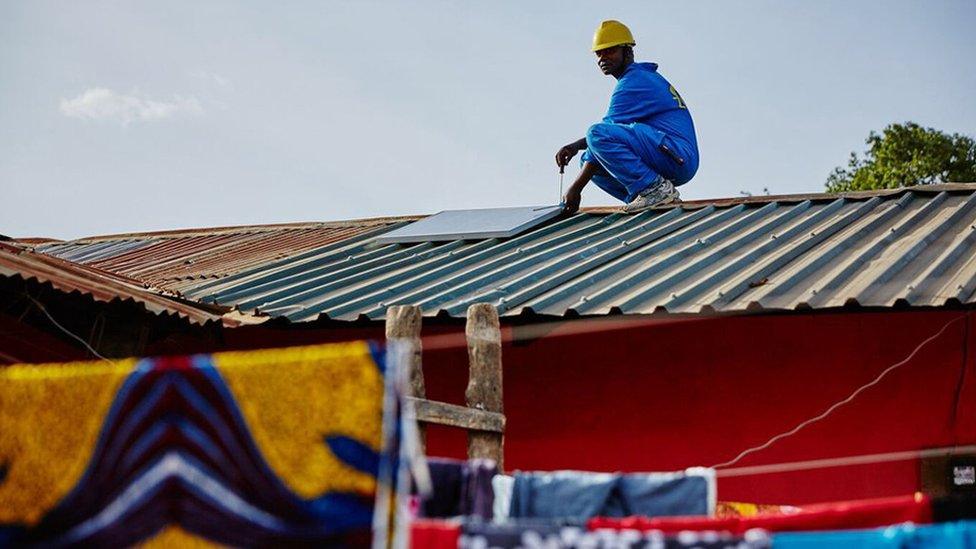 A Zola worker in Rwanda