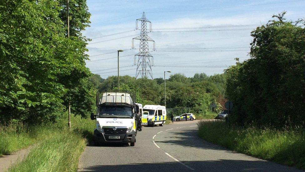 Police vans at an area near Abingdon Road