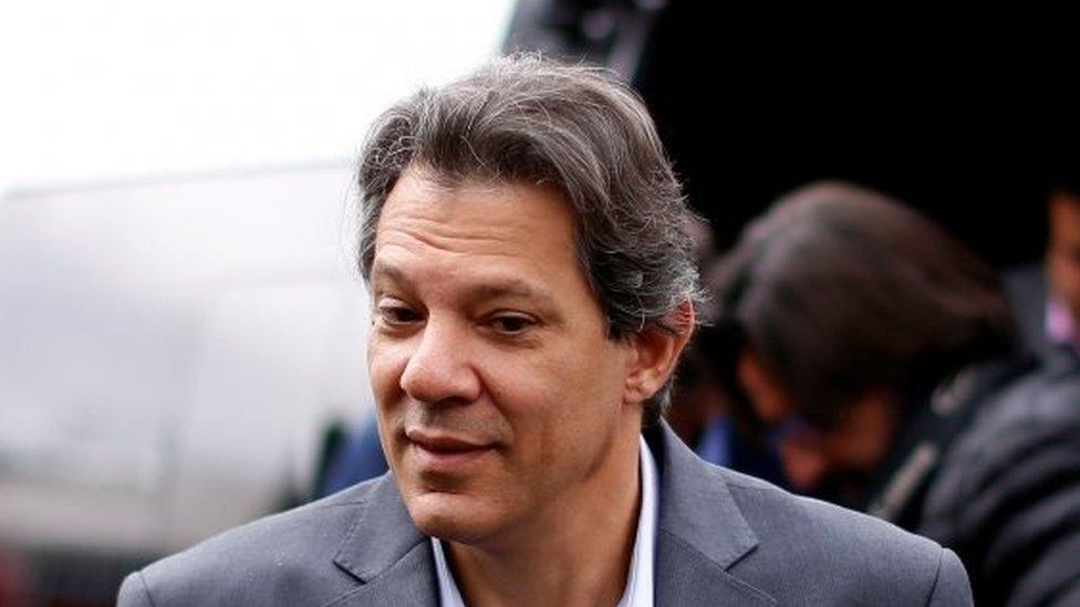 Fernando Haddad arrives at the Federal Police headquarters in Curitiba on 10 September