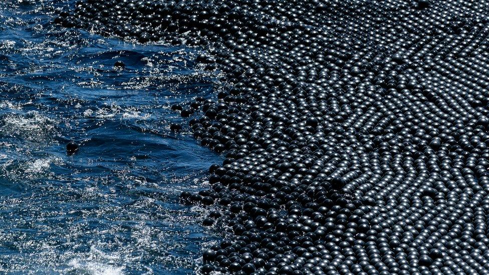 'Shade balls' cover part of a reservoir in California