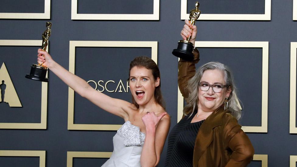 Elena Andreicheva and Carol Dysinger with their Oscars for Learning to Skateboard in a Warzone (If You're a Girl)