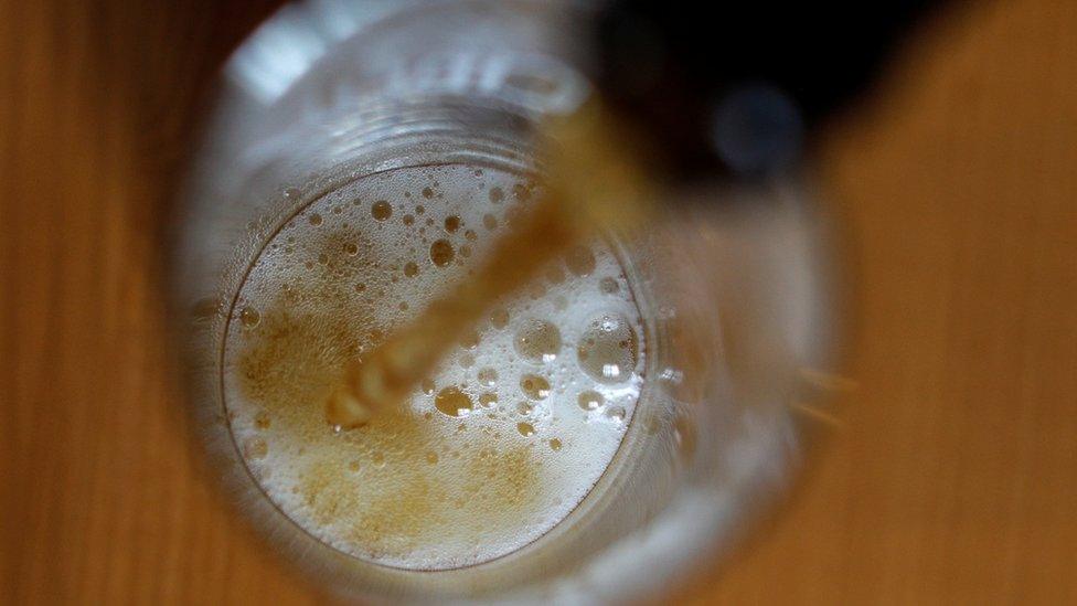 Beer being poured into glass