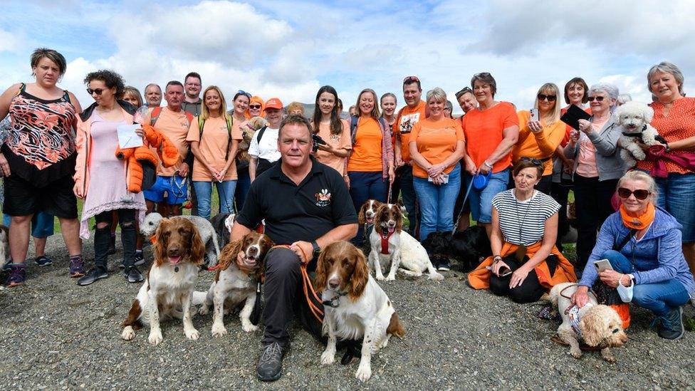 Kerry with his three dogs and other walkers