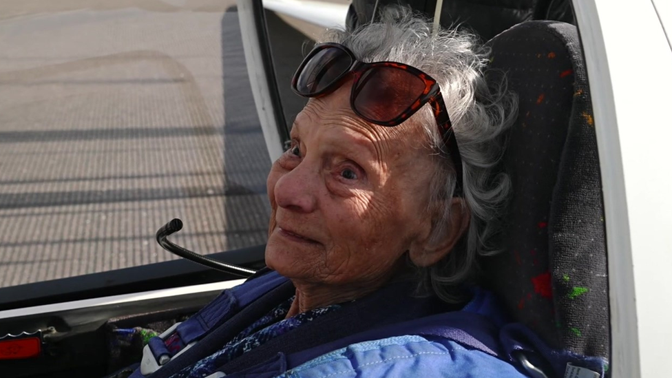 Mrs Orchard inside the glider