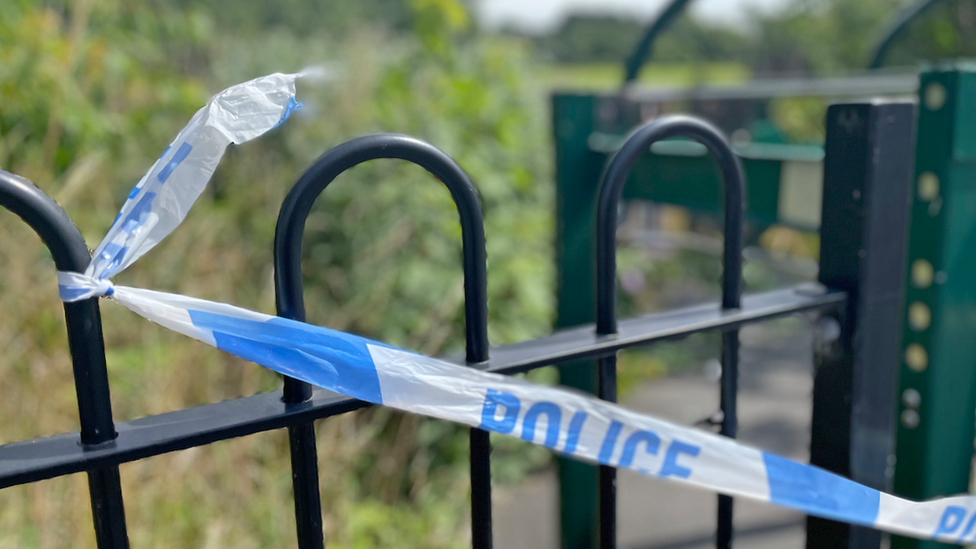 Police tape at the scene of the crash