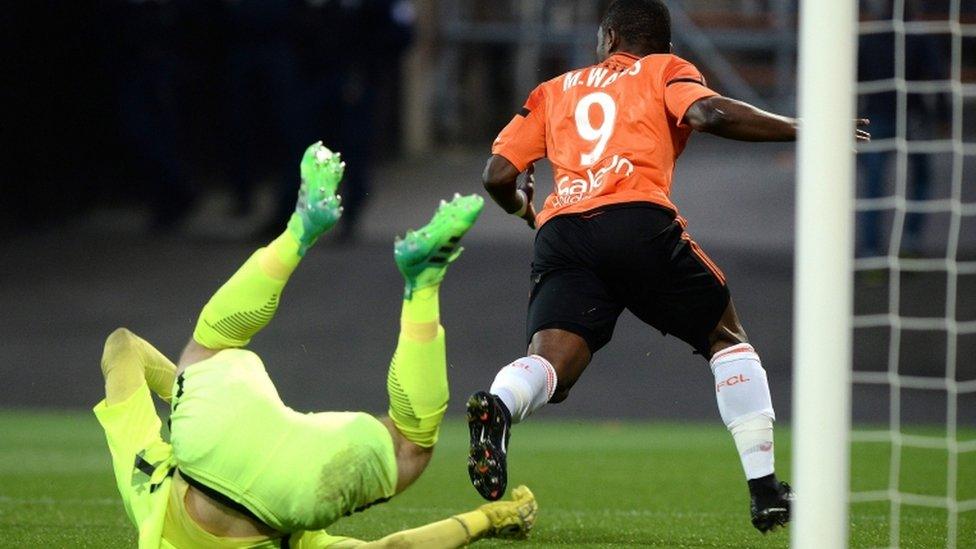 Lorient's Ghanaian forward Abdul Majeed Waris (R) scores for Lorient against Metz on 22 April, 2017