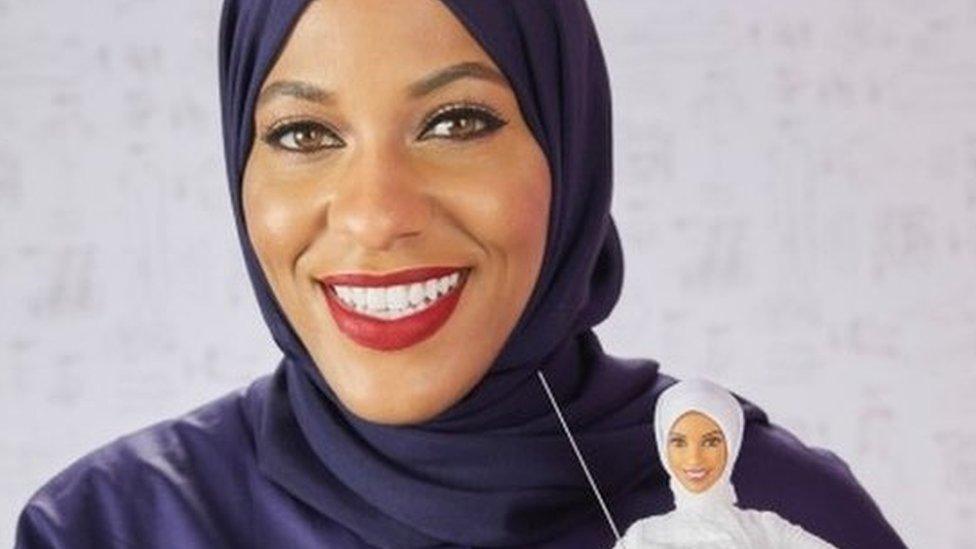 Ibtihaj Muhammad with the Barbie doll that is modelled on her