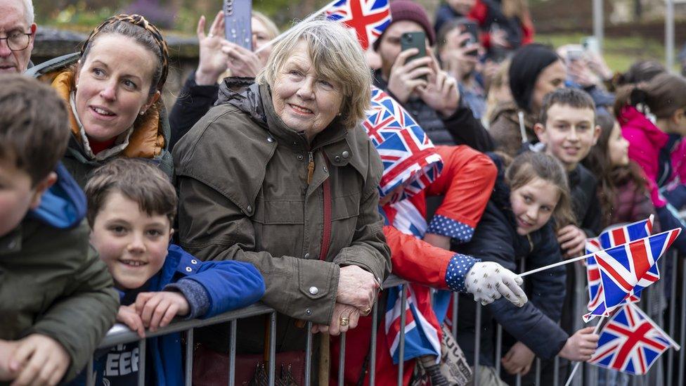 Crowds waiting to greet the royal couple